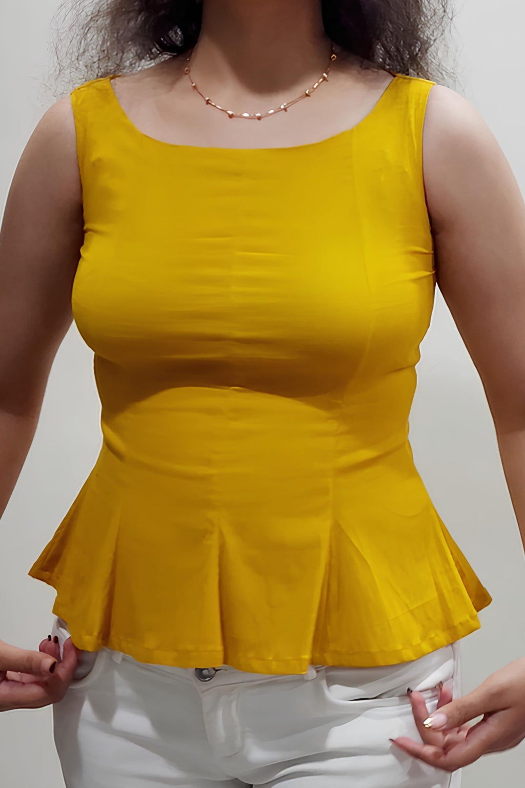 Yellow peplum top