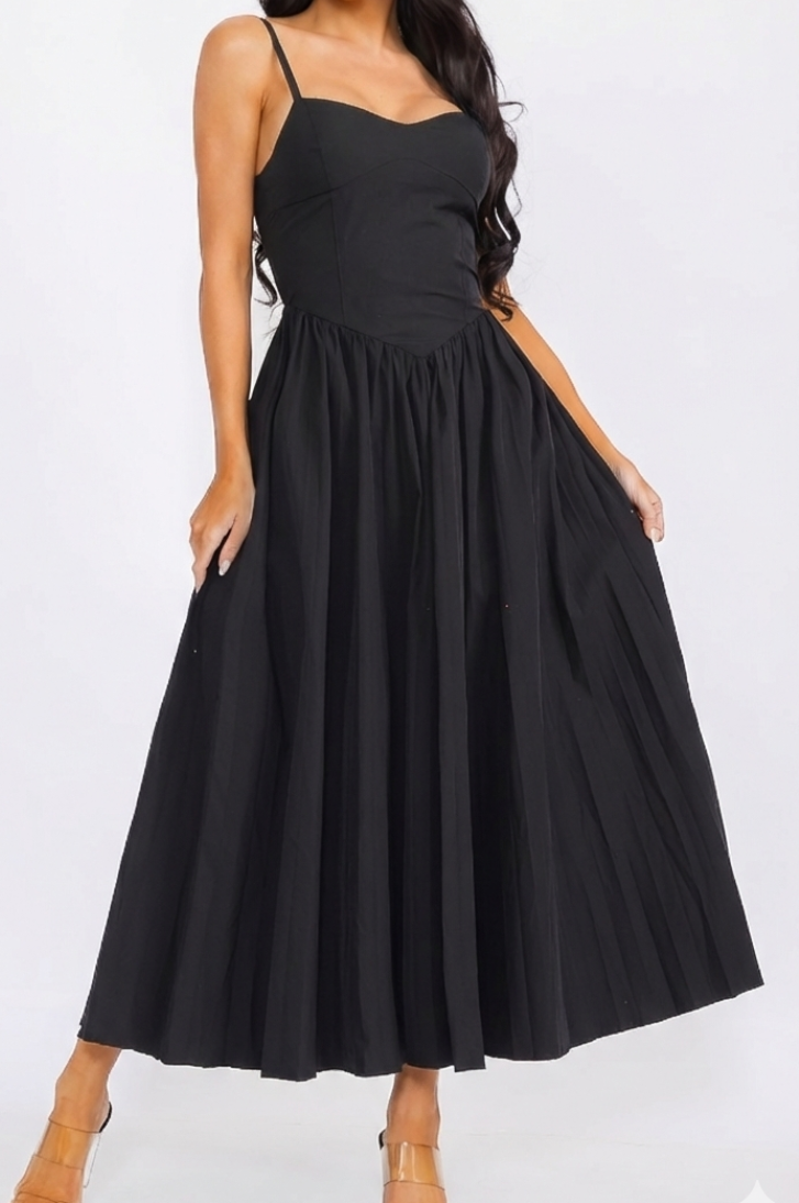 Woman wearing a black dress on a white background