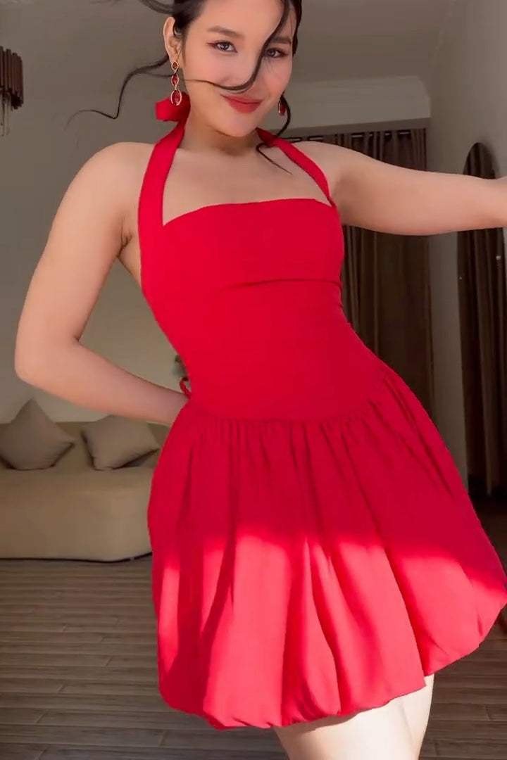 Woman wearing a red dress indoors